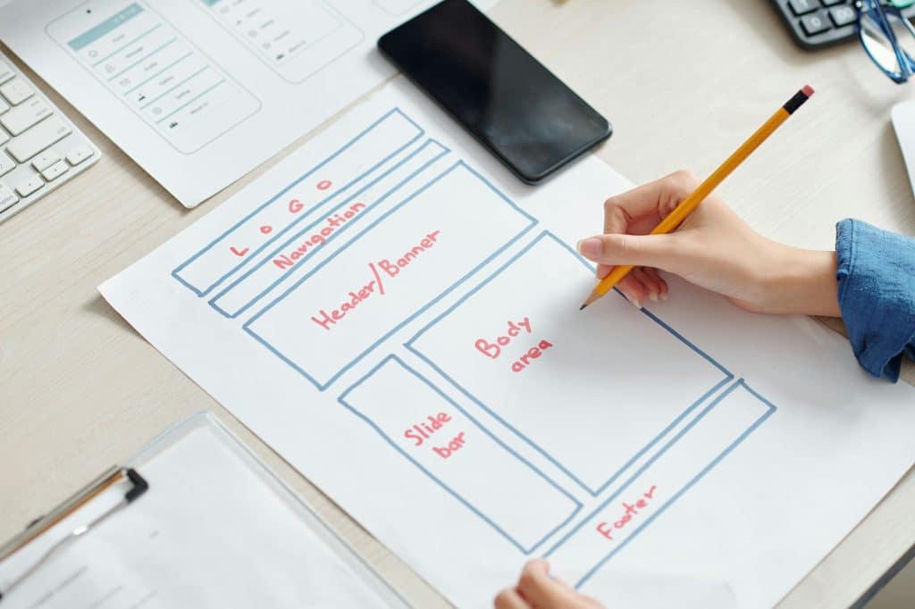 UI designer drawing interface layout